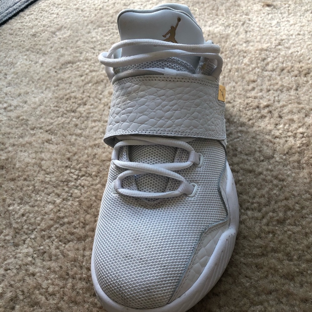 White Jordan brand sneakers